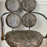 Pair of italian swivel armchairs in chrome-plated metal and piton imitation fabrics