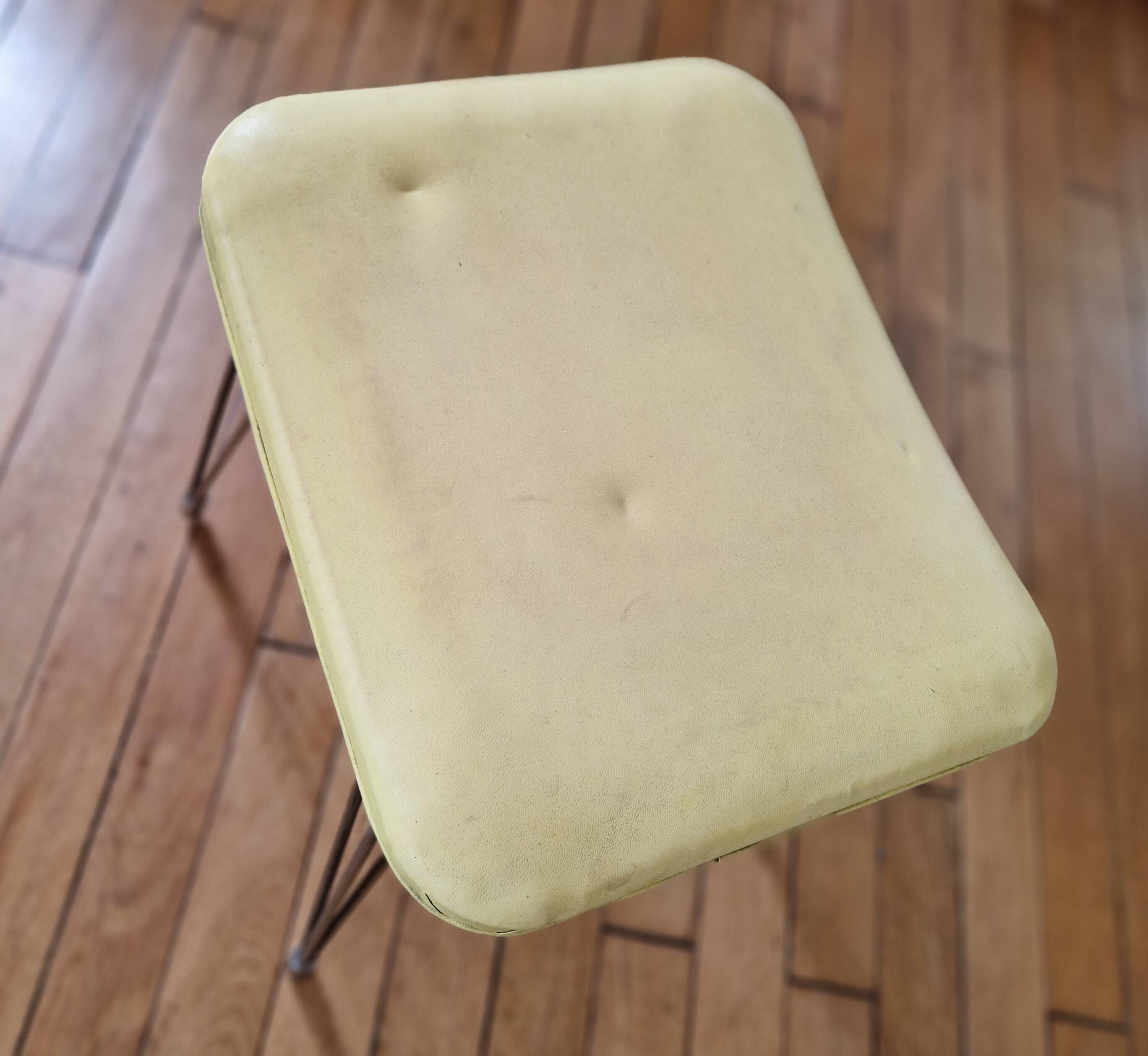 Vintage yellow leatherette stool from the 1950s