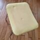 Vintage yellow leatherette stool from the 1950s