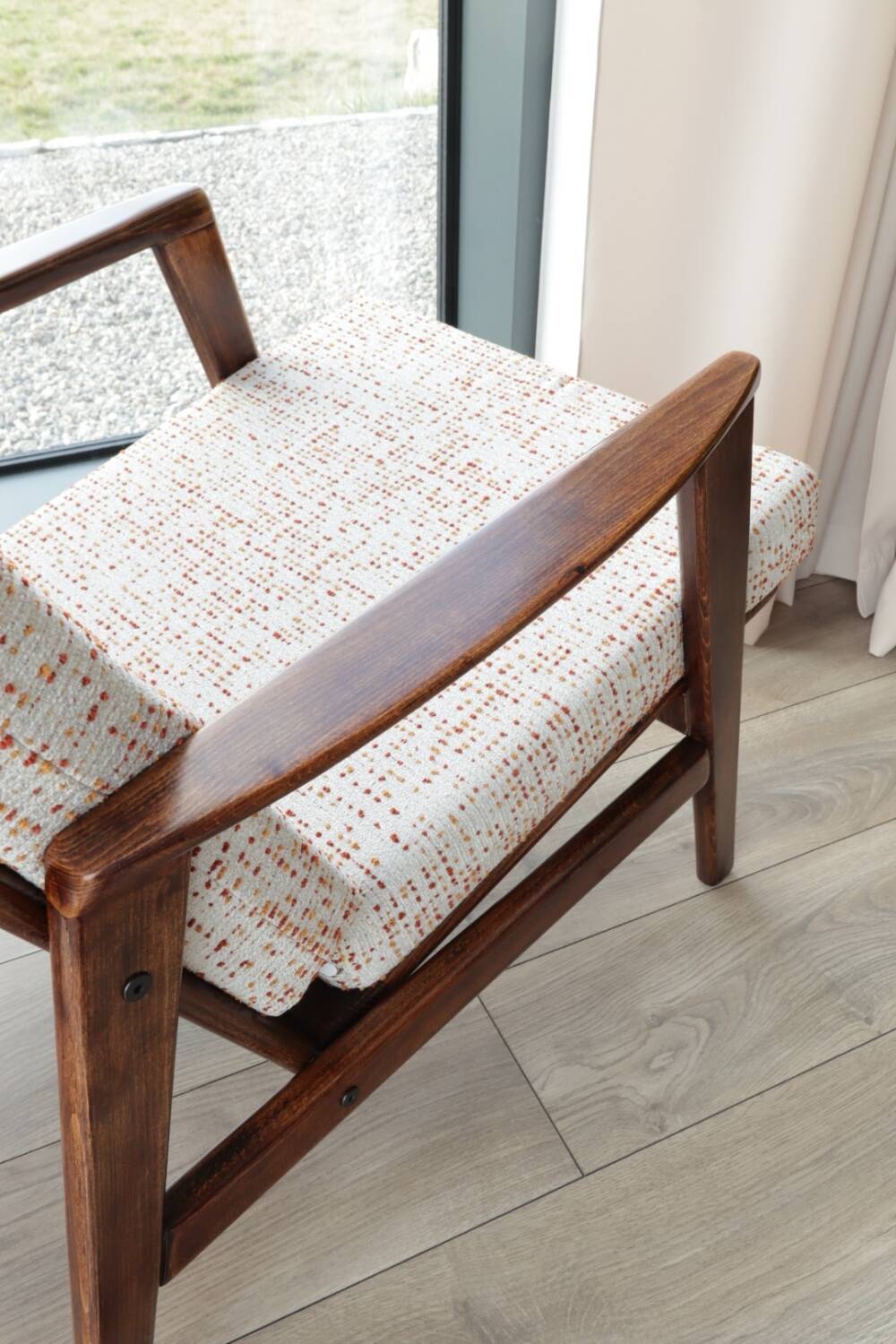 Vintage Danish boucle armchair with orange polka dots from the 1960s.