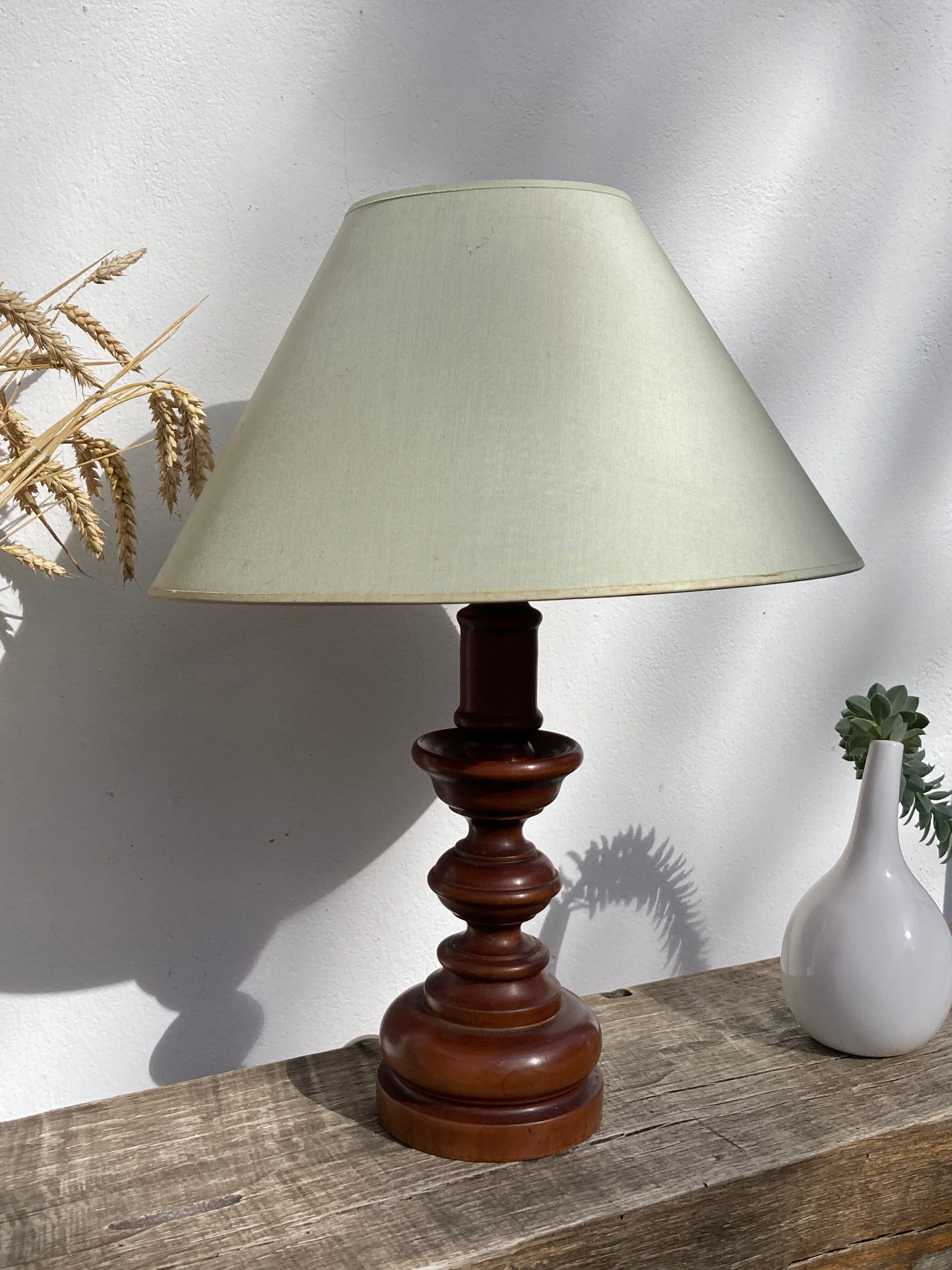 Turned wooden lamp old bluish gray lampshade