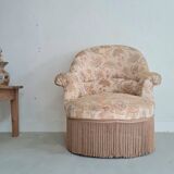 Fauteuil crapaud beige motifs floraux à franges