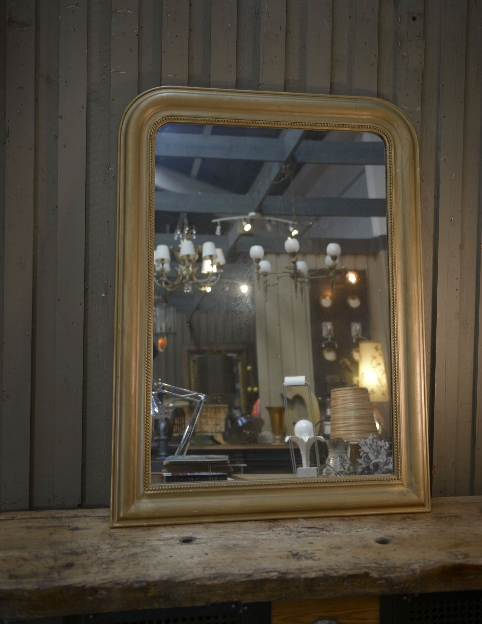 Old mirror in gilded wood 19th