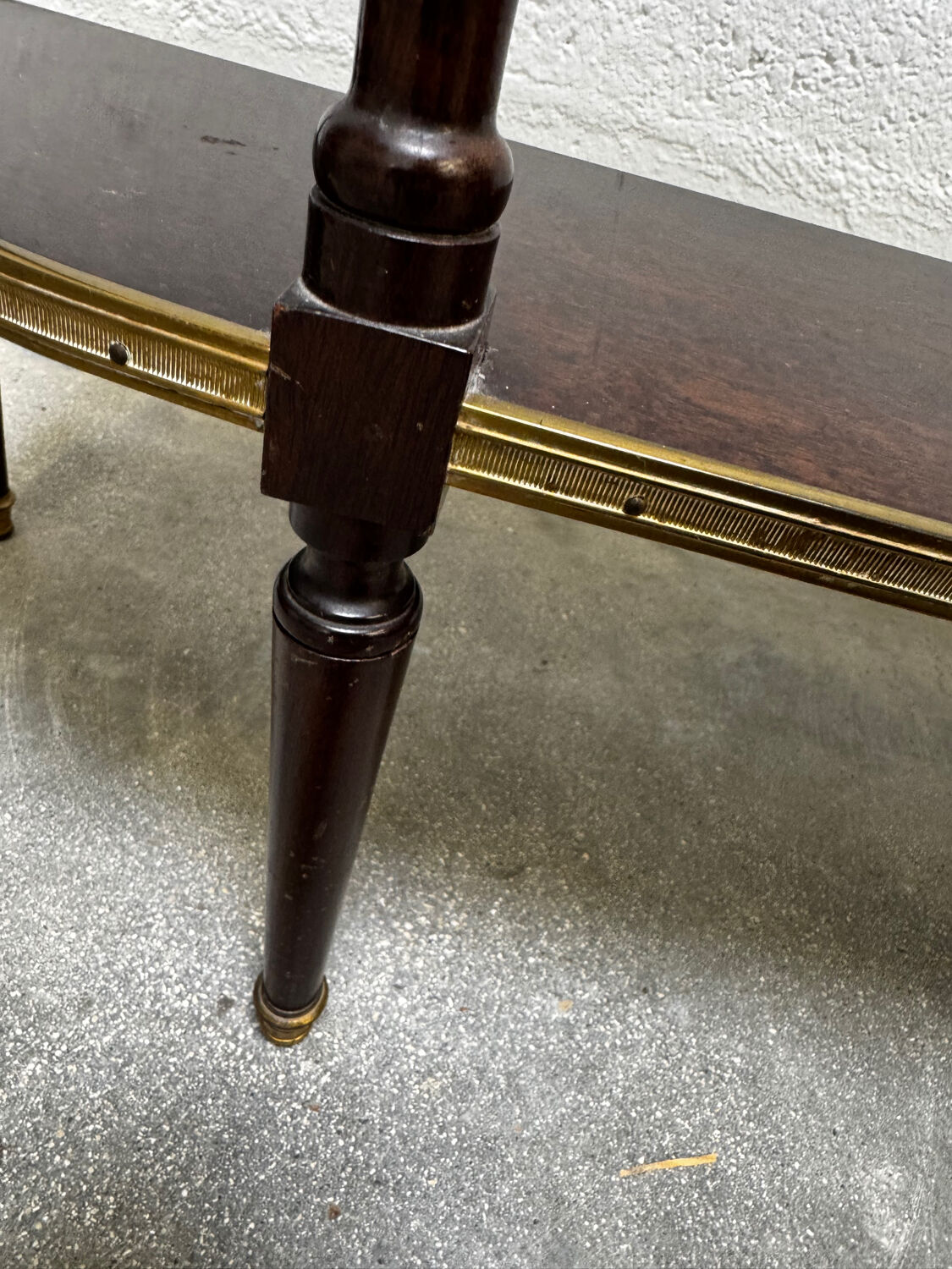 Louis XVI demi-moon console in wood and brass.