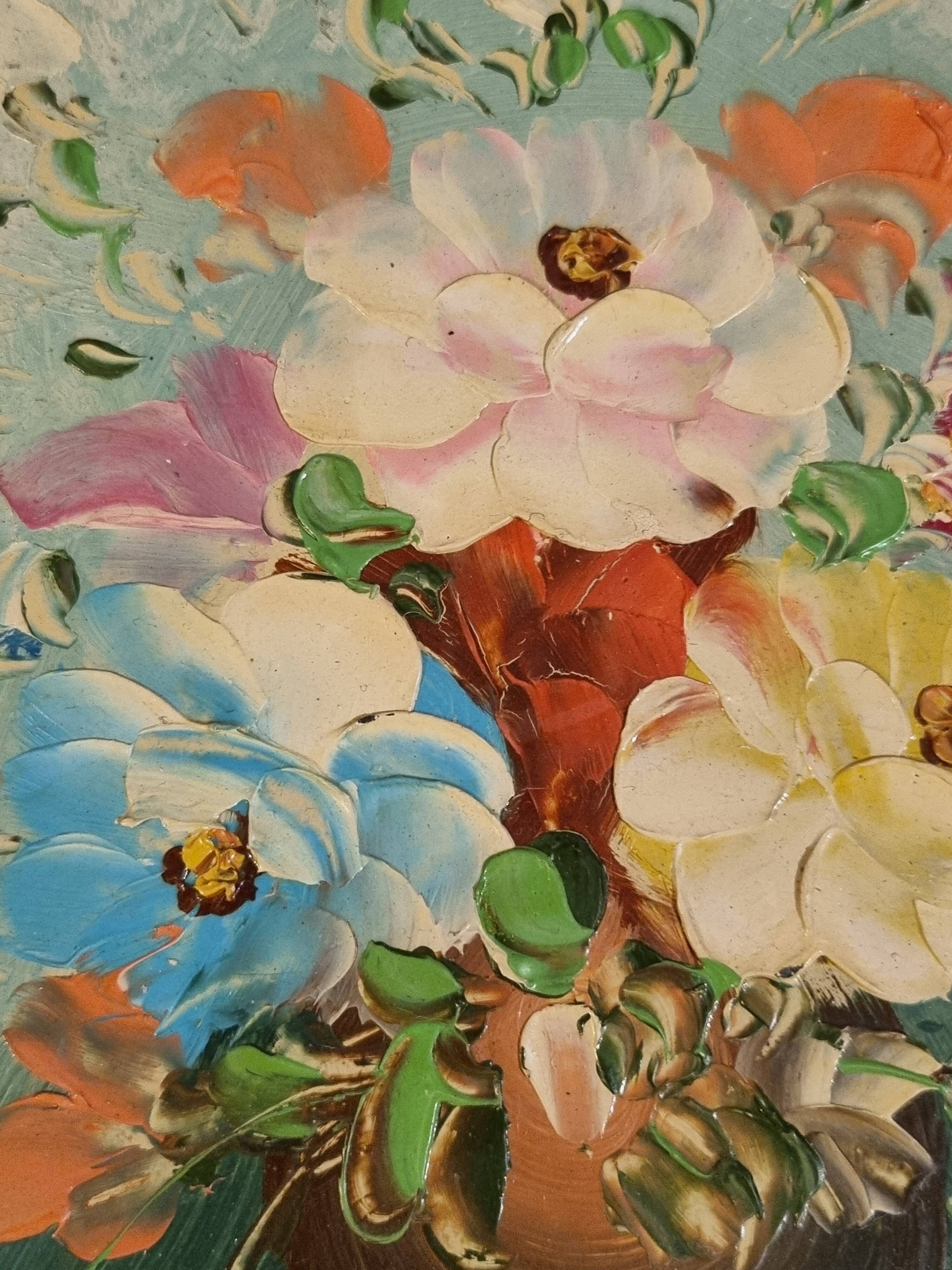 Oil painting of a bouquet of flowers.