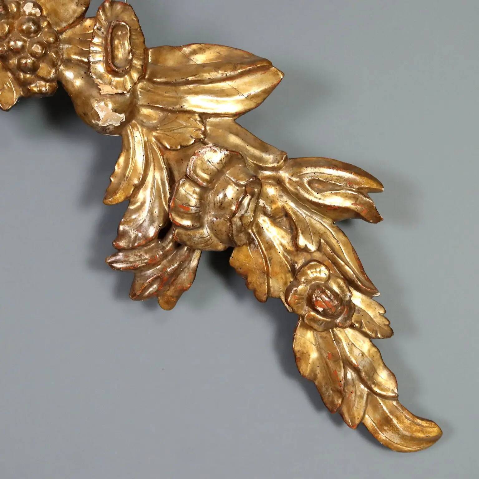 Ancient baroque frieze in carved and gilded wood, Italy, 18th century.