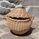 Round wicker basket with lid