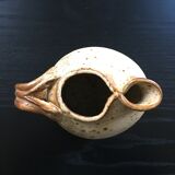 Speckled beige sandstone pitcher