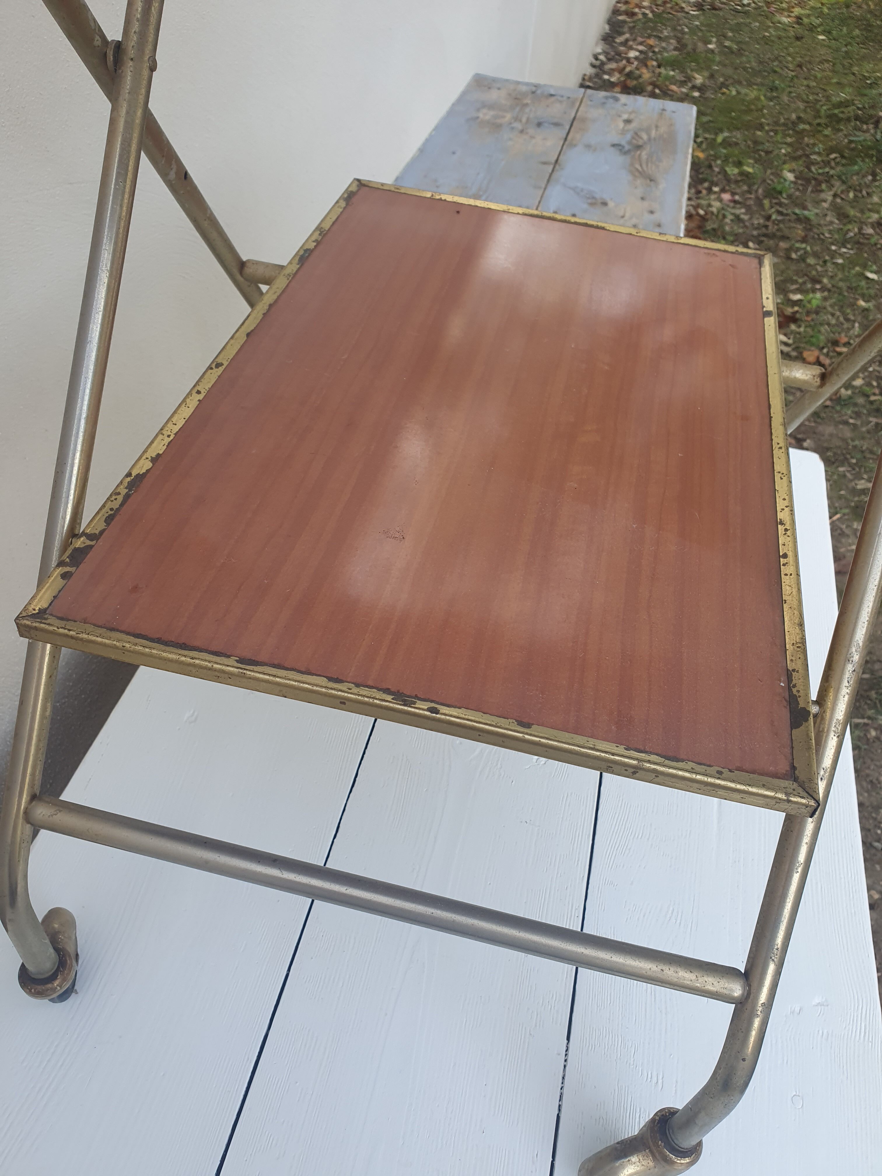 Vintage folding rolling service in Formica and brass plated