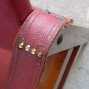 Leather and wood relaxed armchair