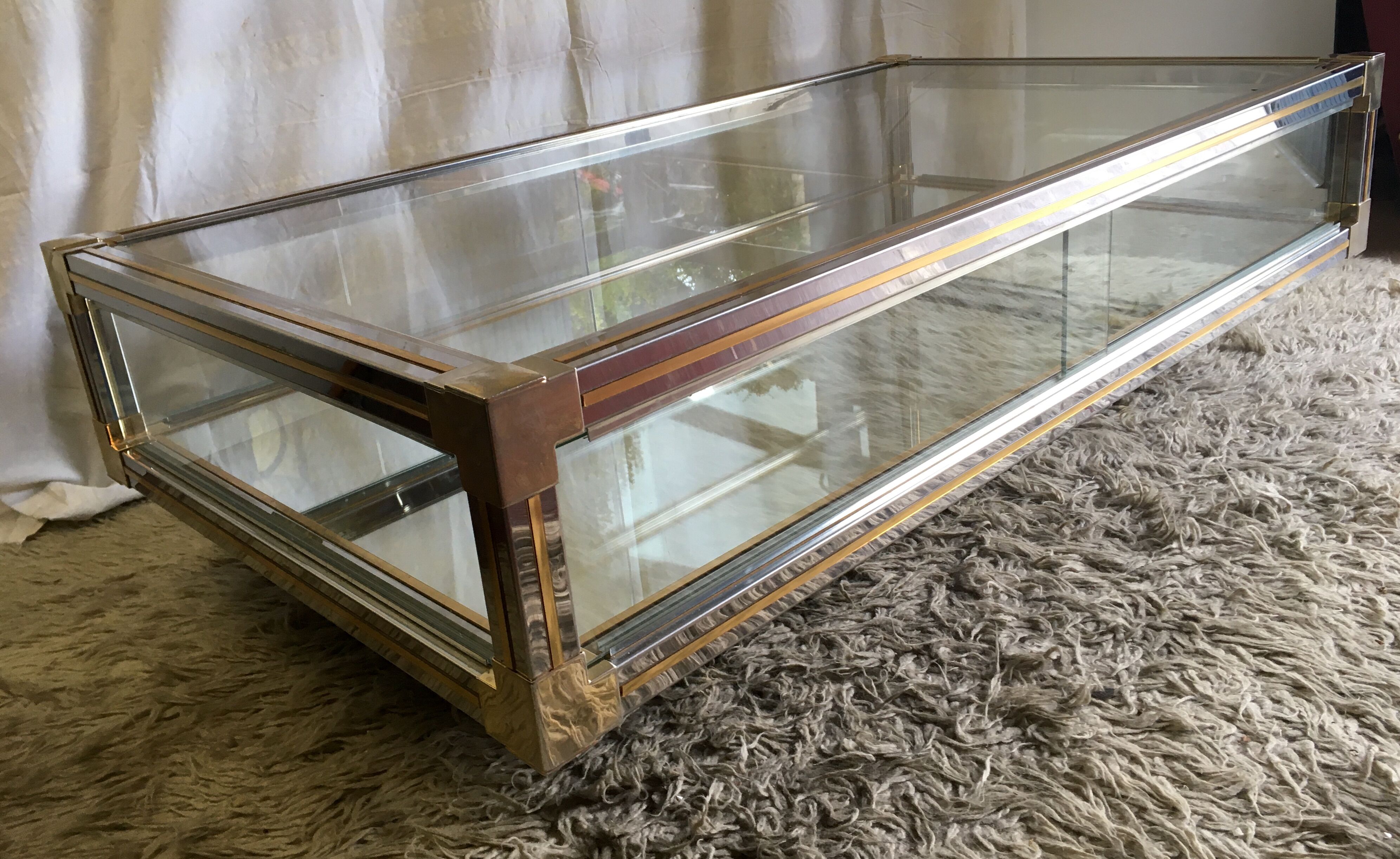 Glass and gold glass and metal coffee table 70