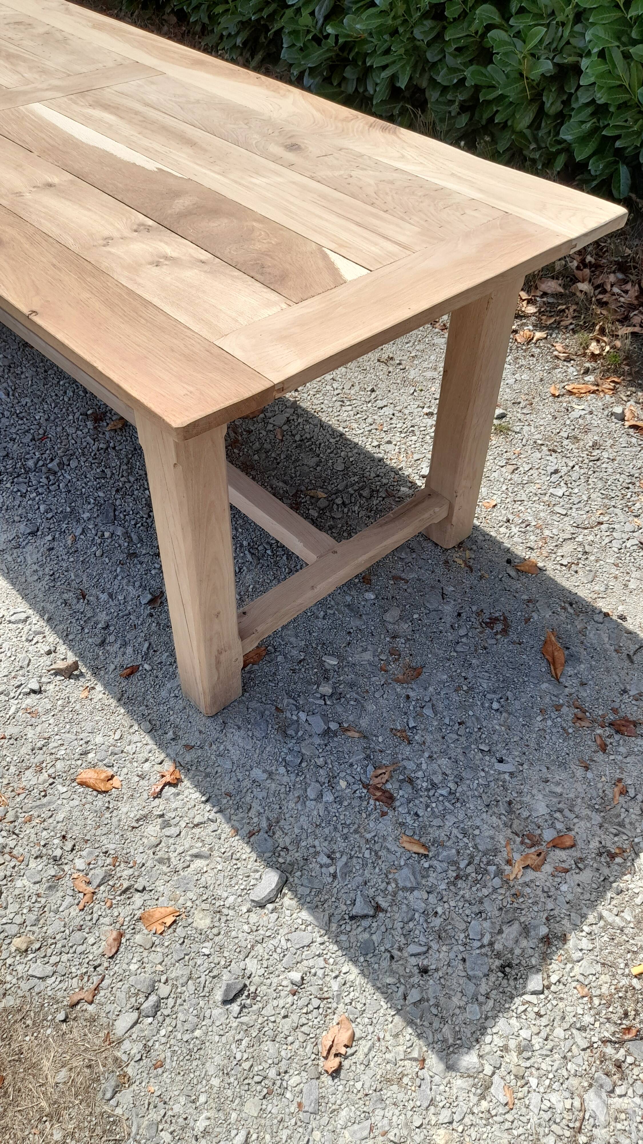 Solid oak farmhouse table in raw wood
