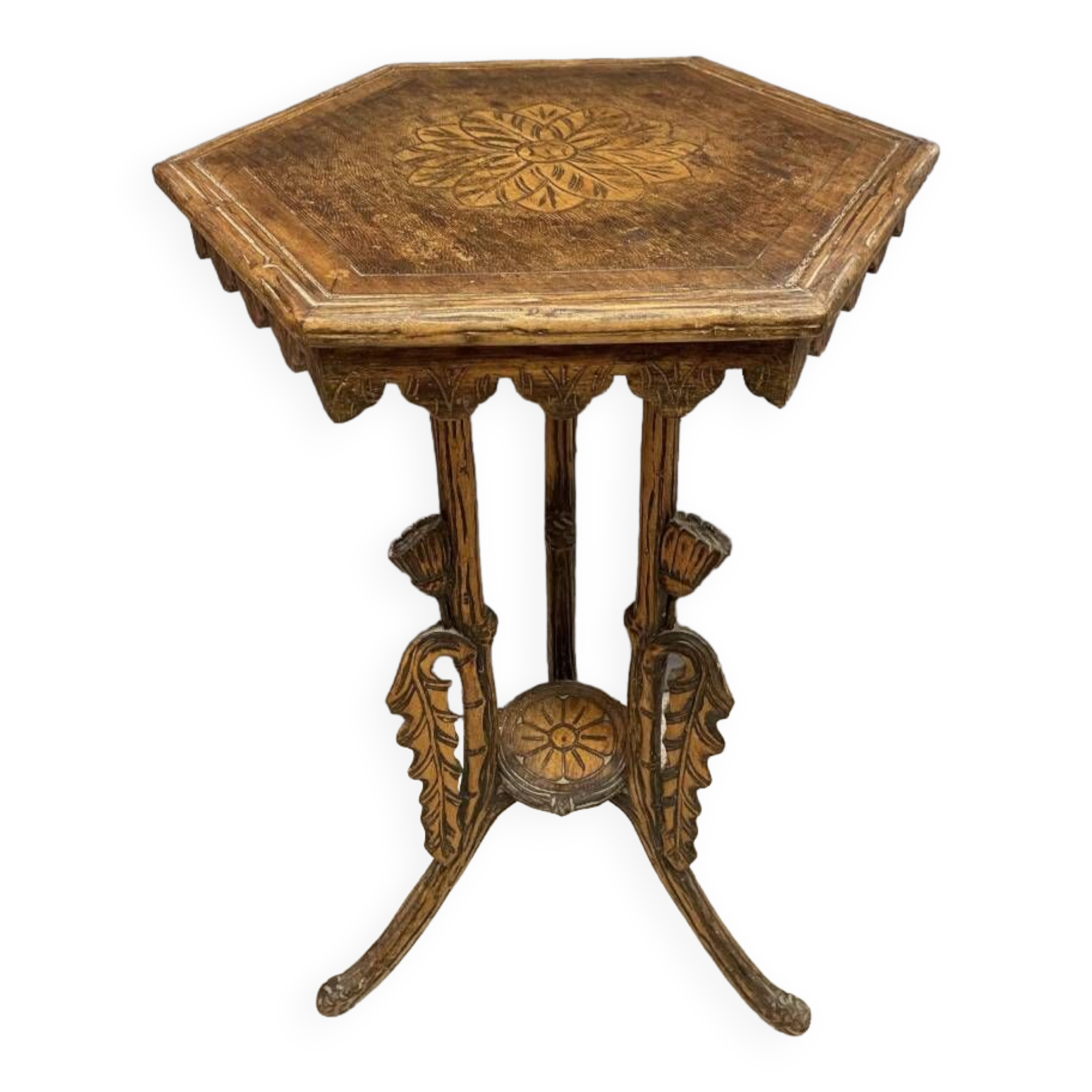 Carved wooden pedestal table
