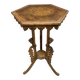 Carved wooden pedestal table