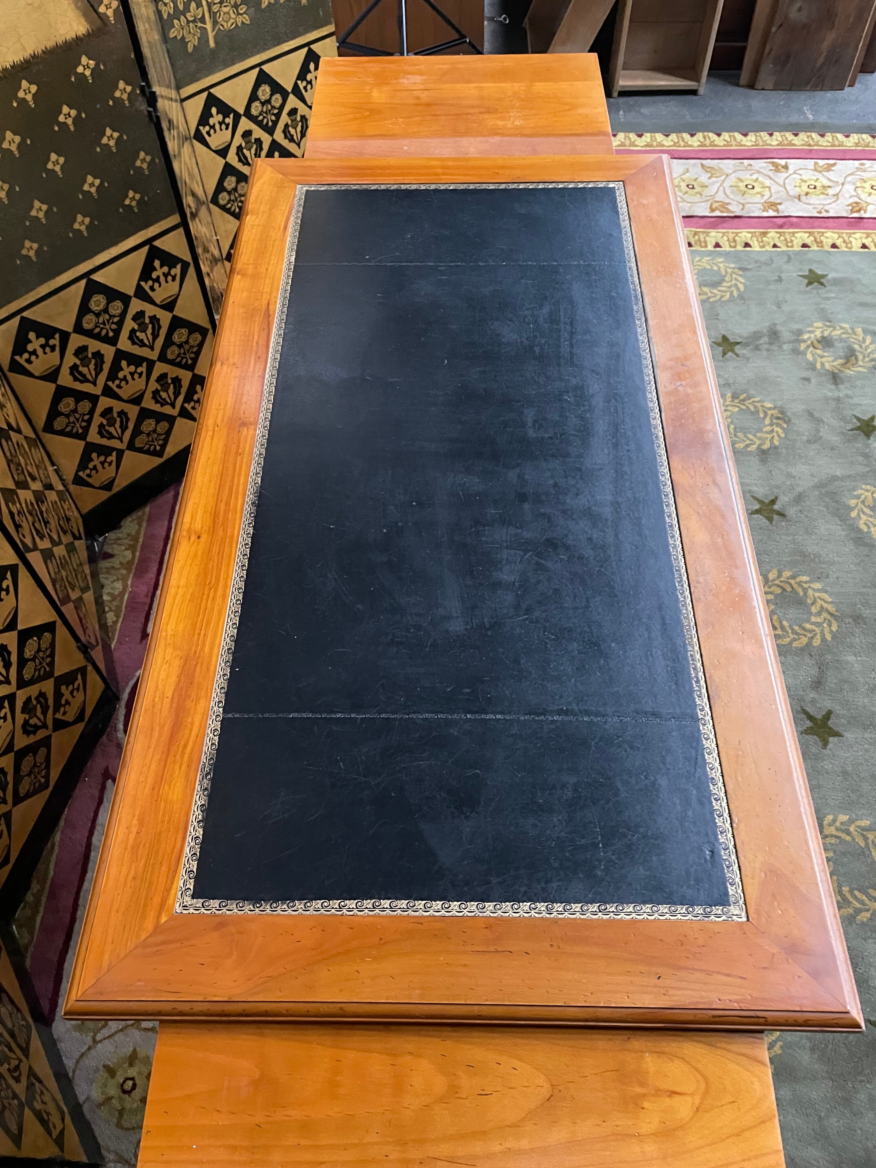 Desk full of Louis XVI style black leather