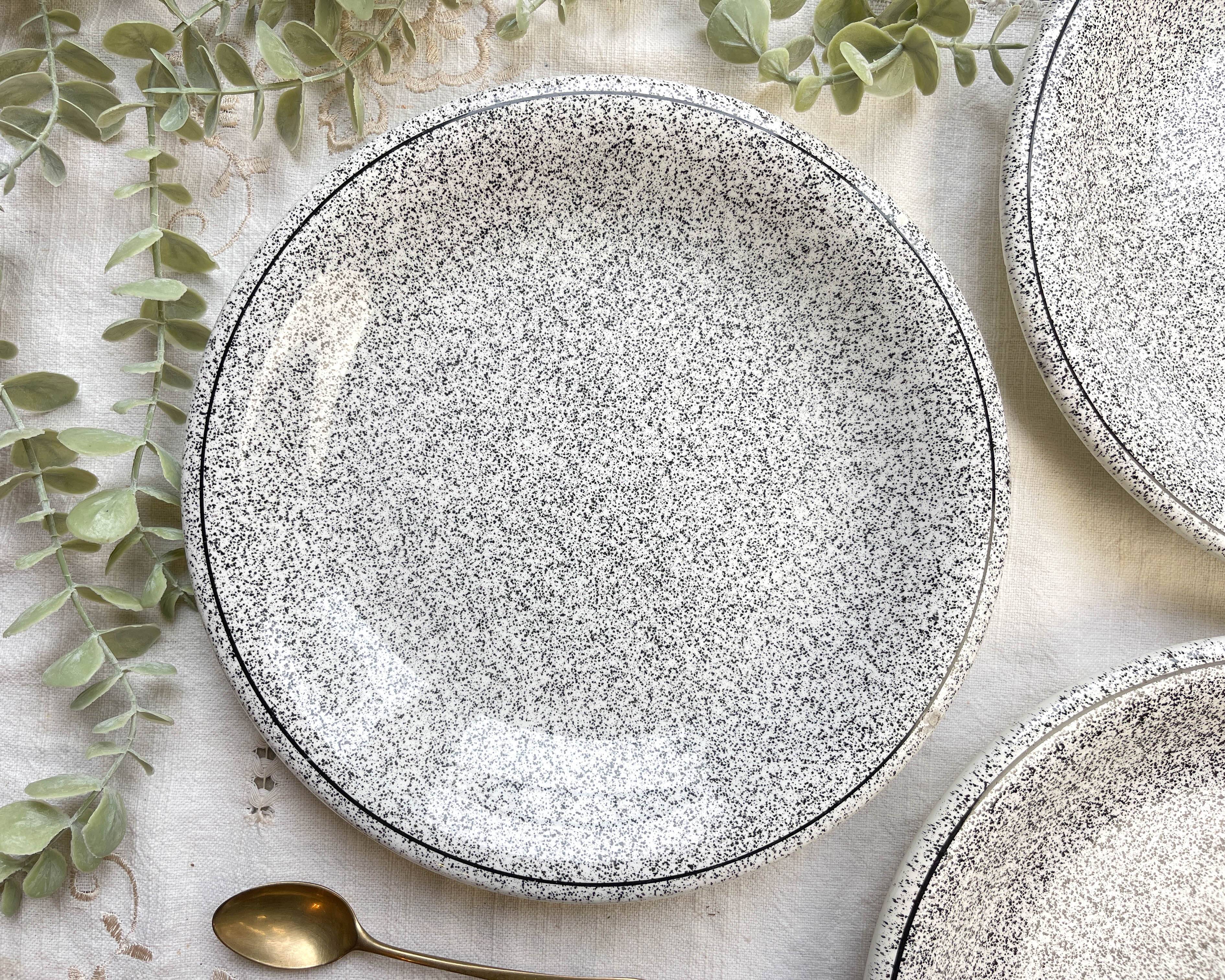 3 Black and white speckled Italian earthenware plates