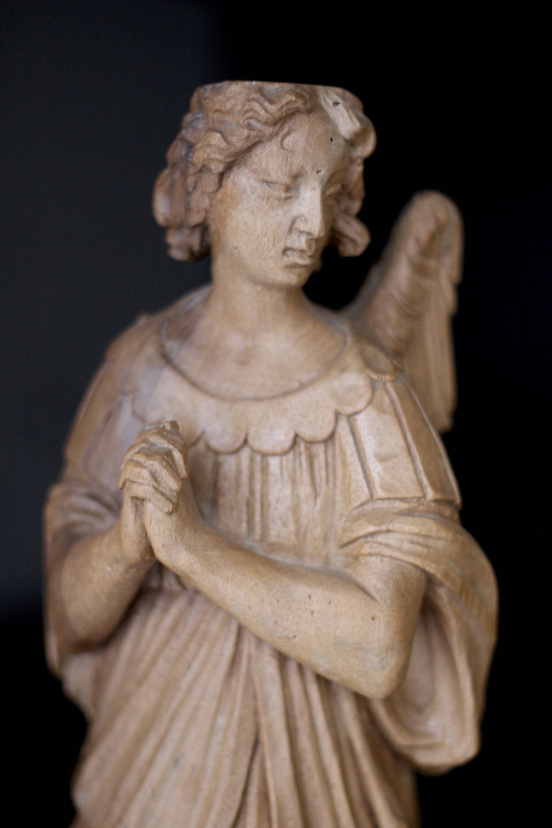Sacred art: 19th century beechwood cherub statuette