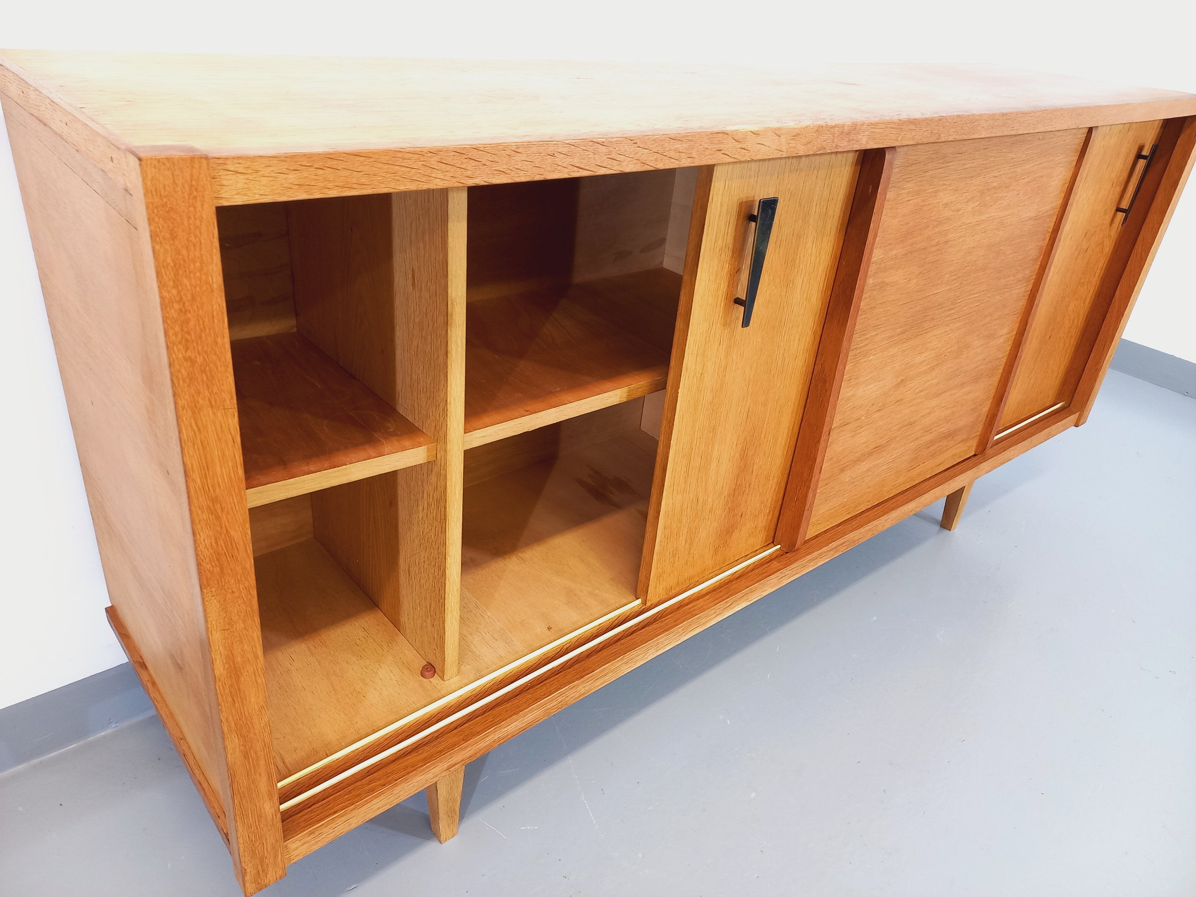 Vintage row in light oak wood from the 60s