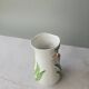 Vase in slipware with Arum flowers