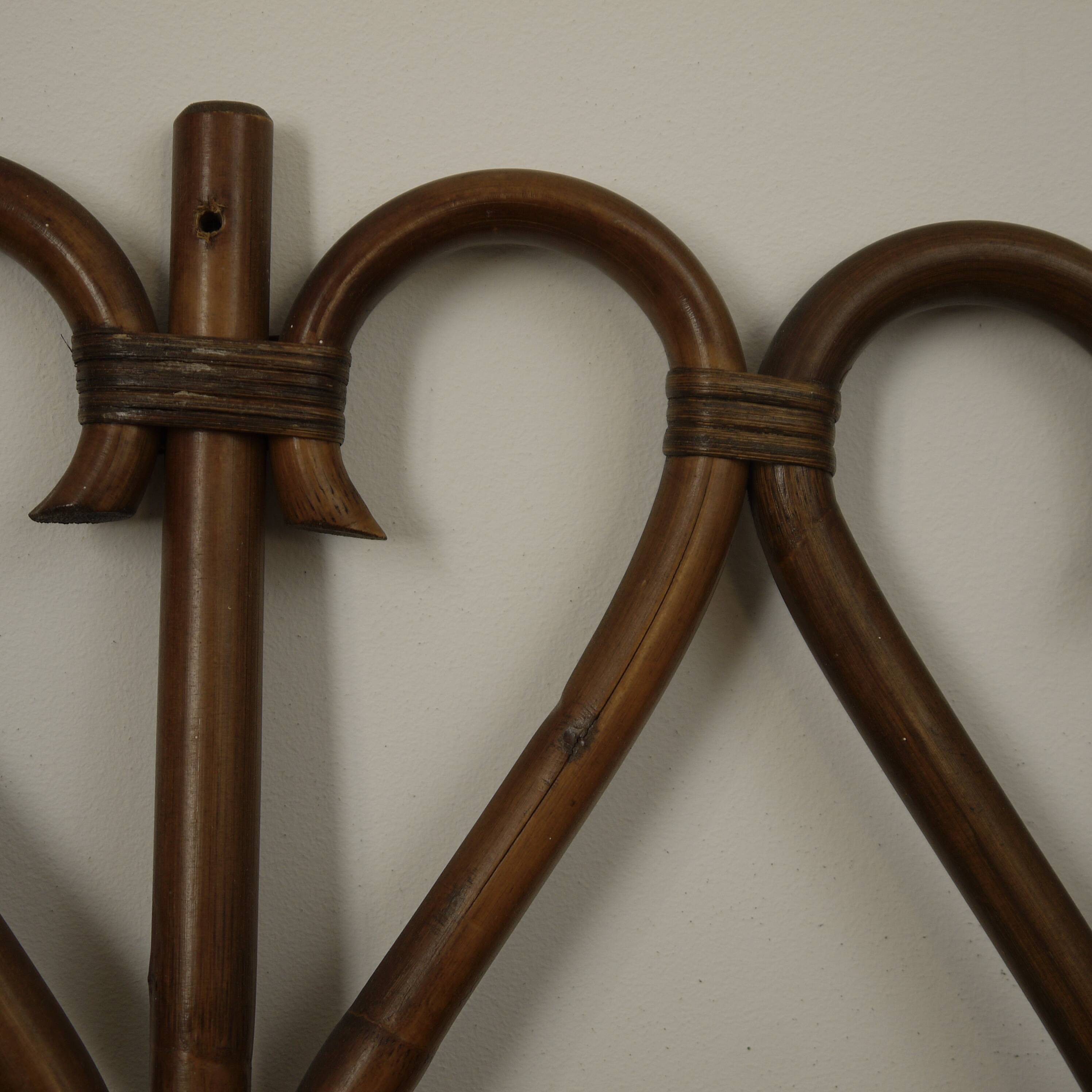 Rattan coat hanger