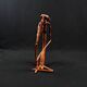 Dogon Nommo bronze statue with brown patina and red highlights, mid-20th century