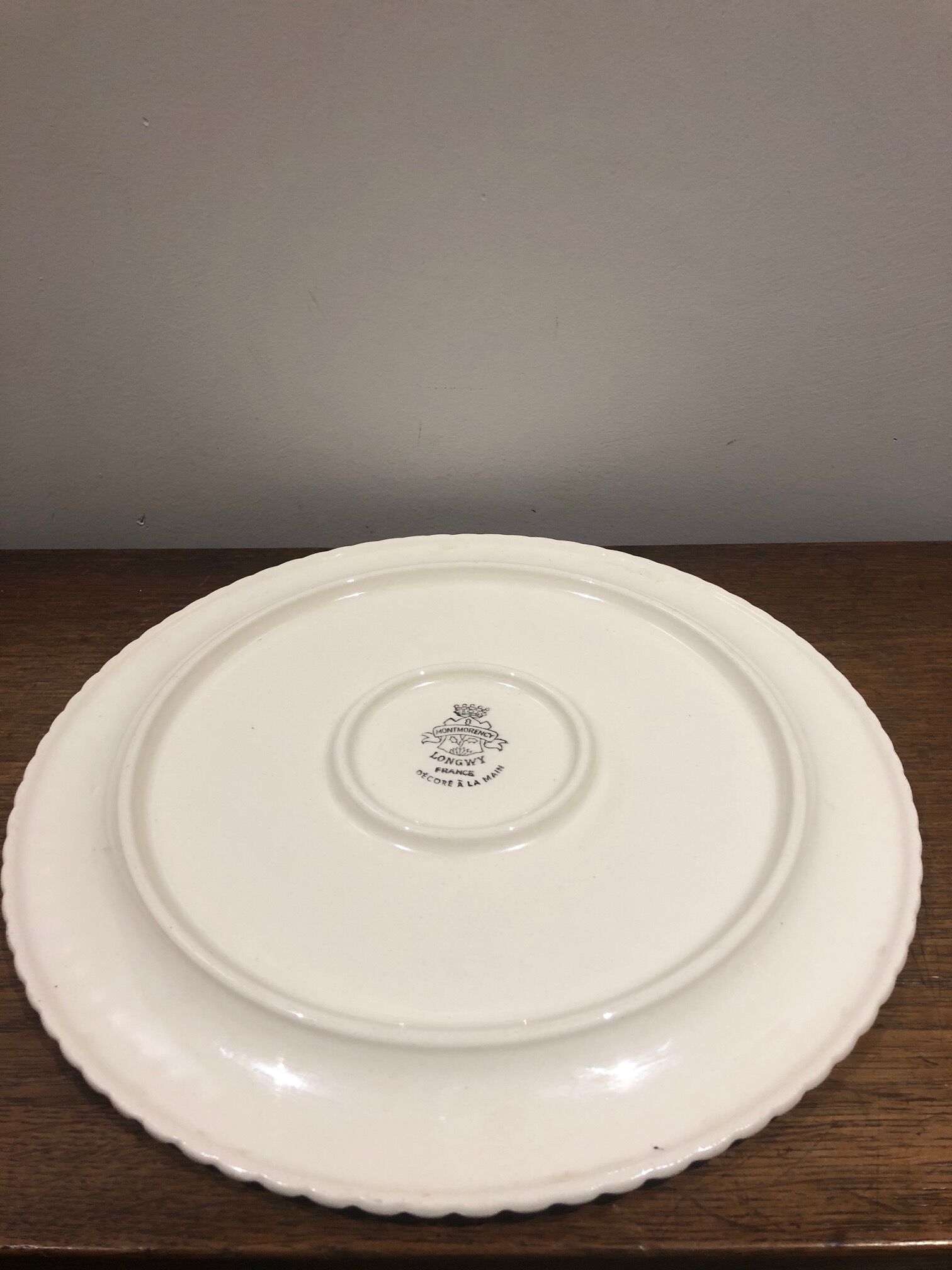 Longwy earthenware dish decorated with cherries