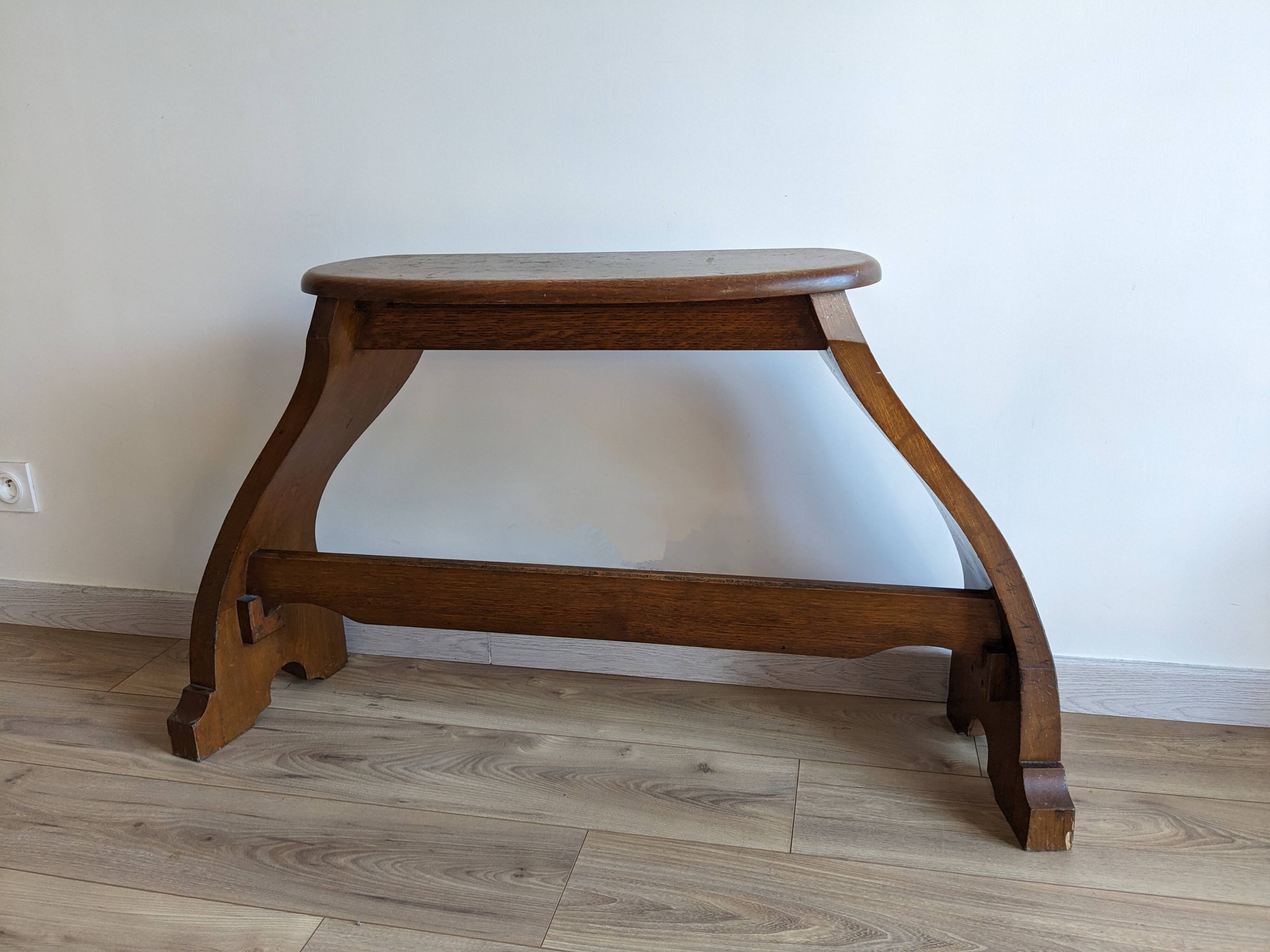 Old church organ bench in Art Nouveau style made of solid oak.