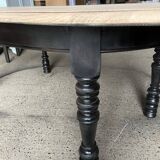 Oval table with integrated extension
