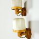 Pair of articulated "Cocoon" wall lights, resin and pine, Italy, circa 1970