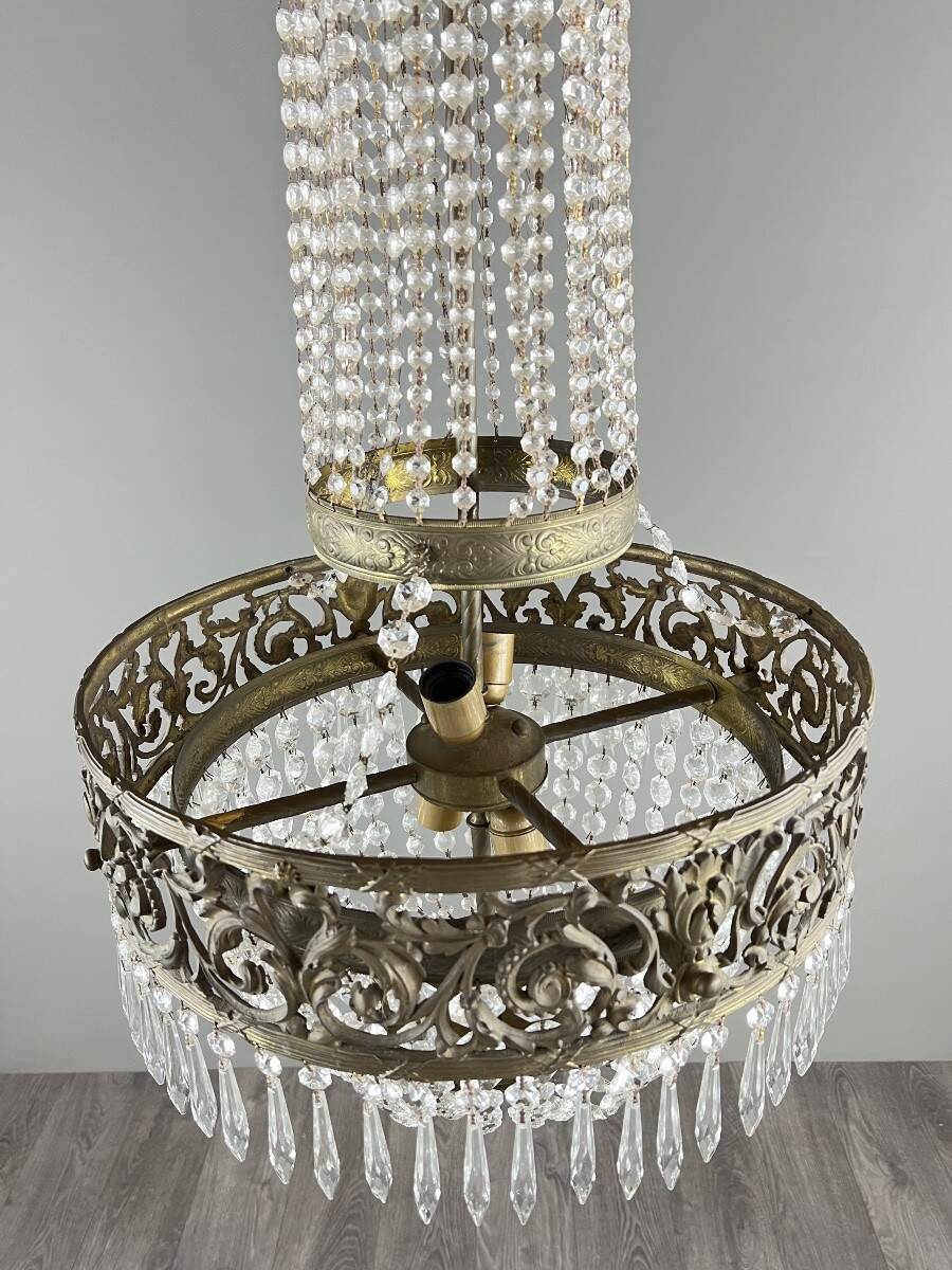 Empire-style chandelier in bronze with crystal pendants, early 20th century.