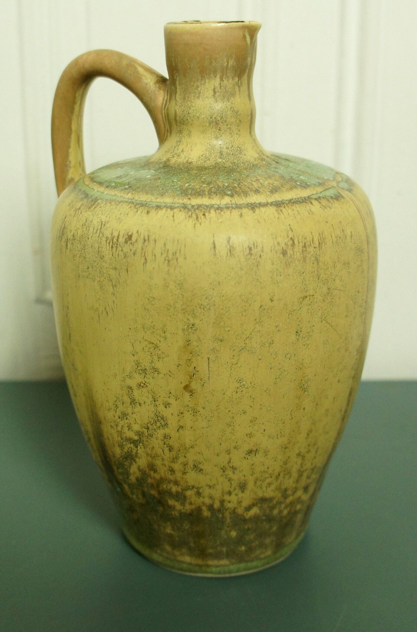 Glazed porcelain pitcher