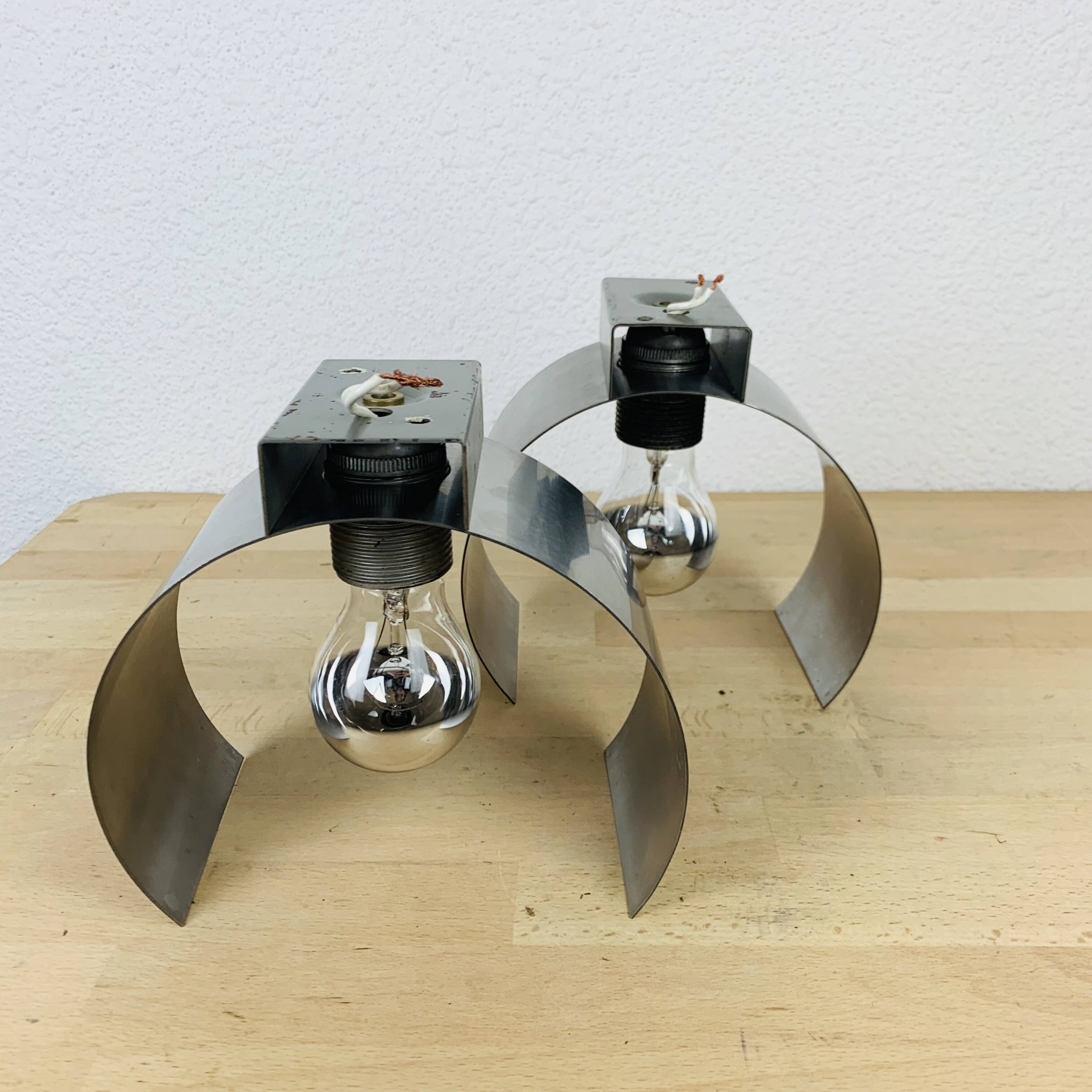 Pair of 70's brushed aluminum space age wall lights