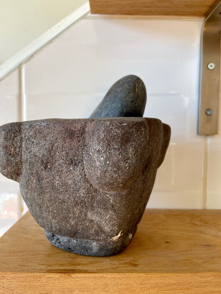 Mortar and pestle in black stone