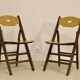 Pair of vintage folding chairs year 50 sculpted backrest.