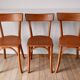 Ensemble de 4 chaises bistrot en bois de hêtre années 50