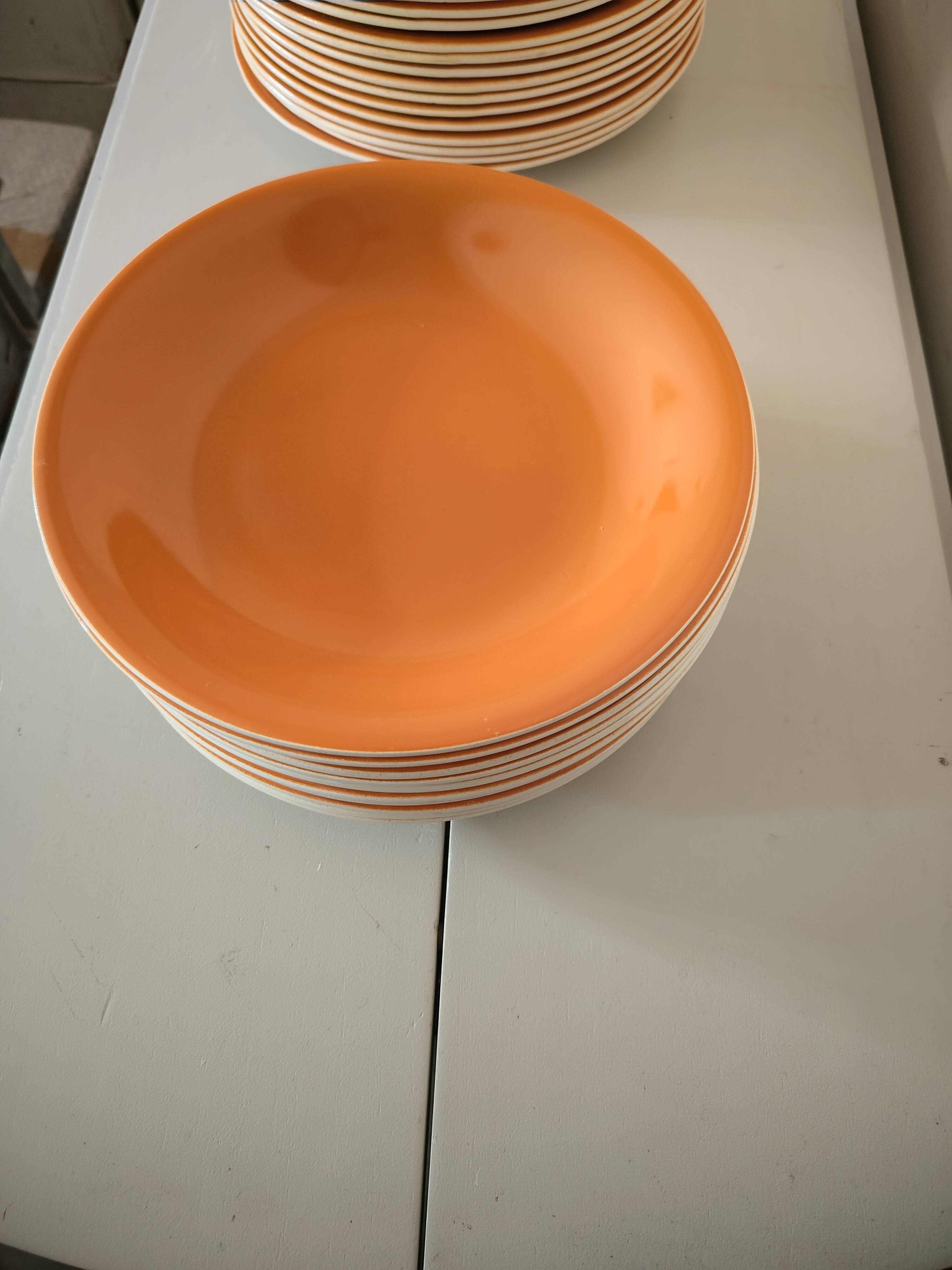 Orange dinner service from Salins