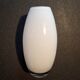 Small contemporary vase in white opaline.
