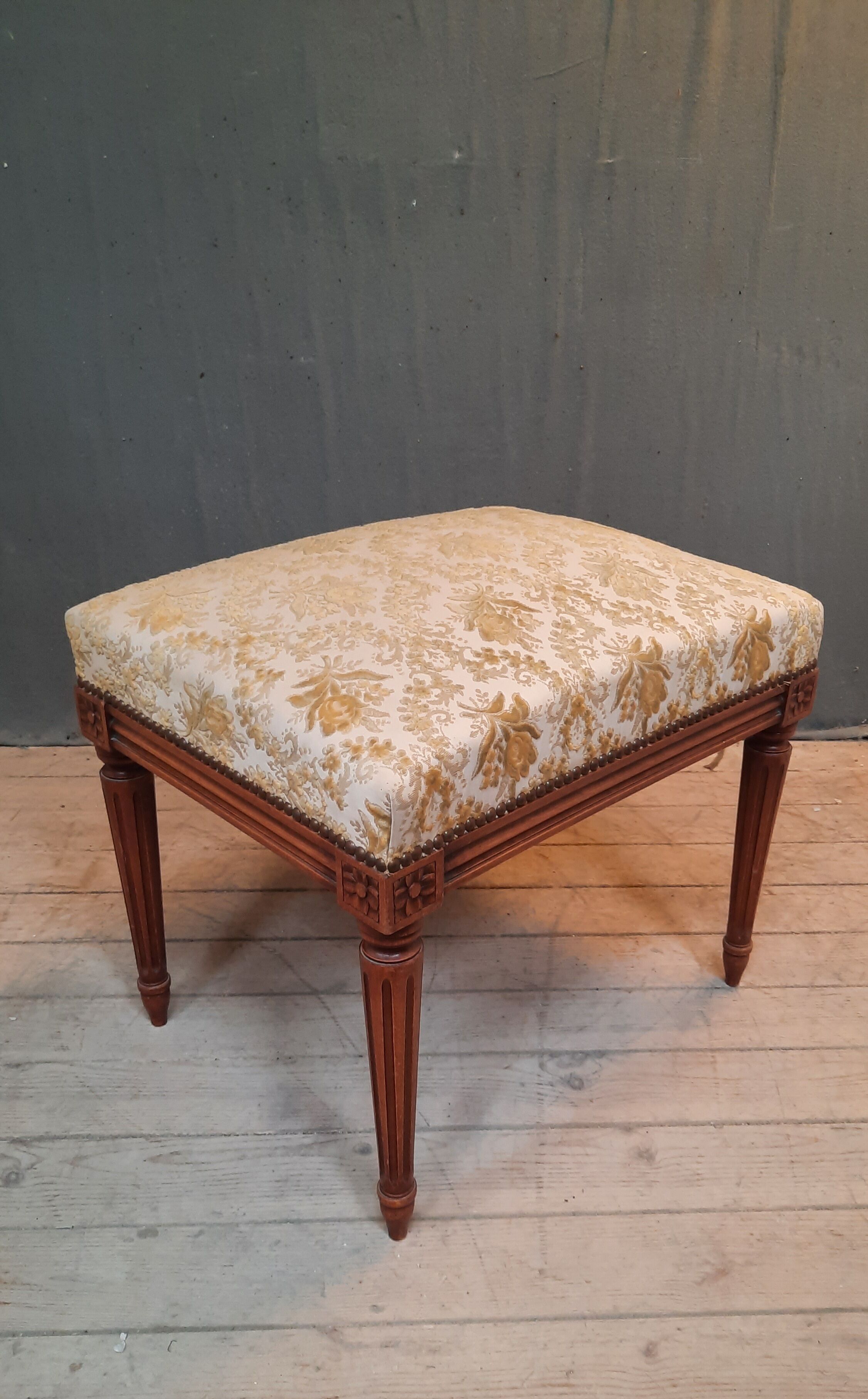 Pouf upholstered in Louis XVI style