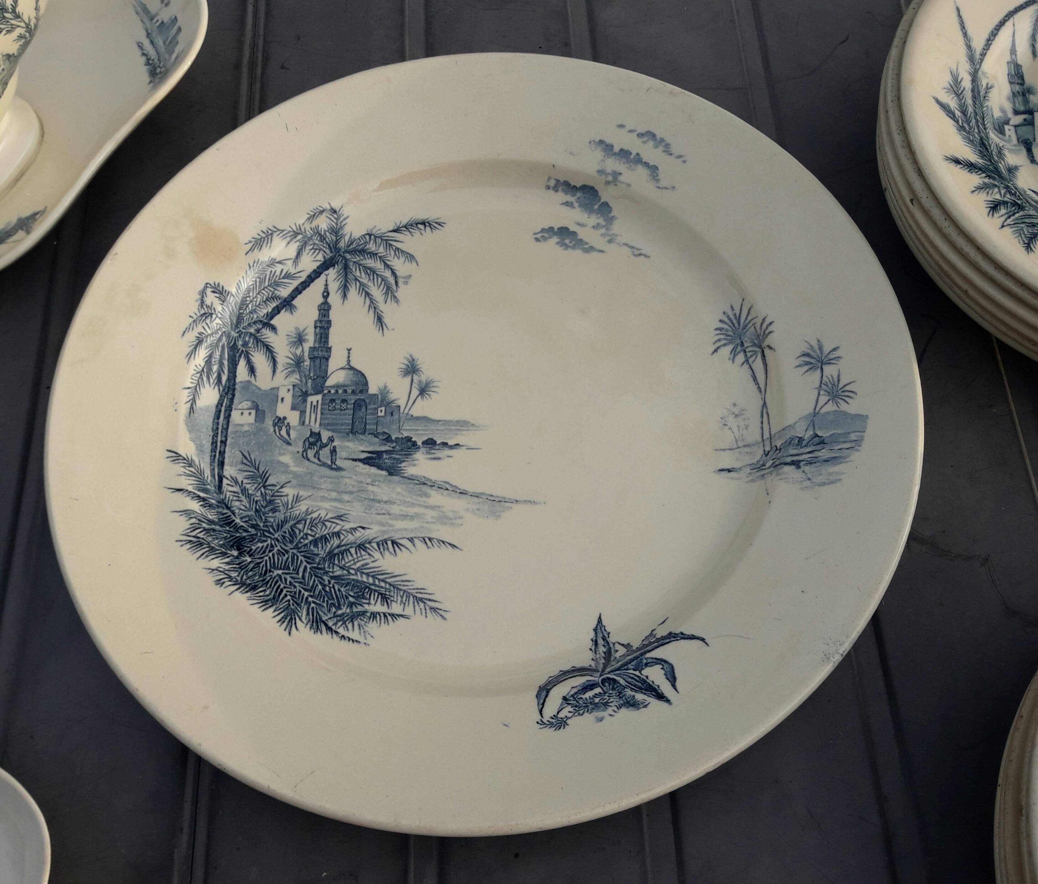Gien earthenware service, Vues d'Orient model, 21 pieces, late 19th century