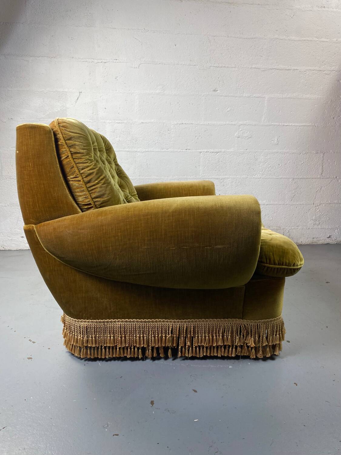 Fauteuil club vintage en tissu vert
