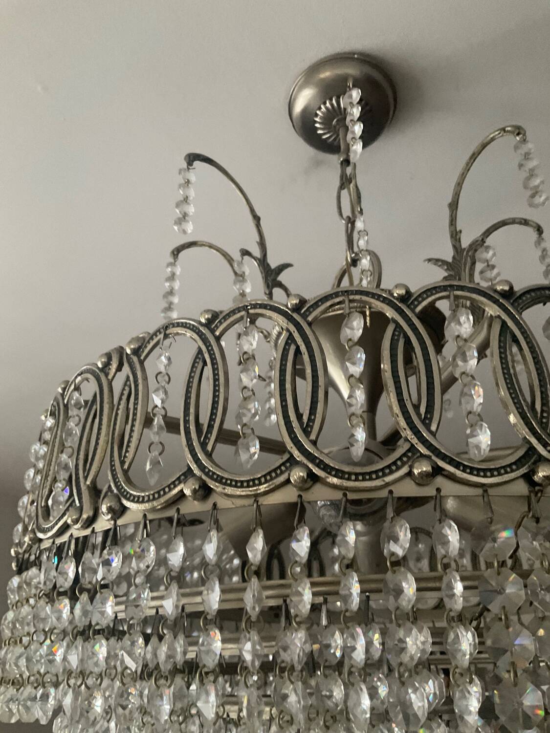 Cascading chandelier with crystal and silvered bronze pendants