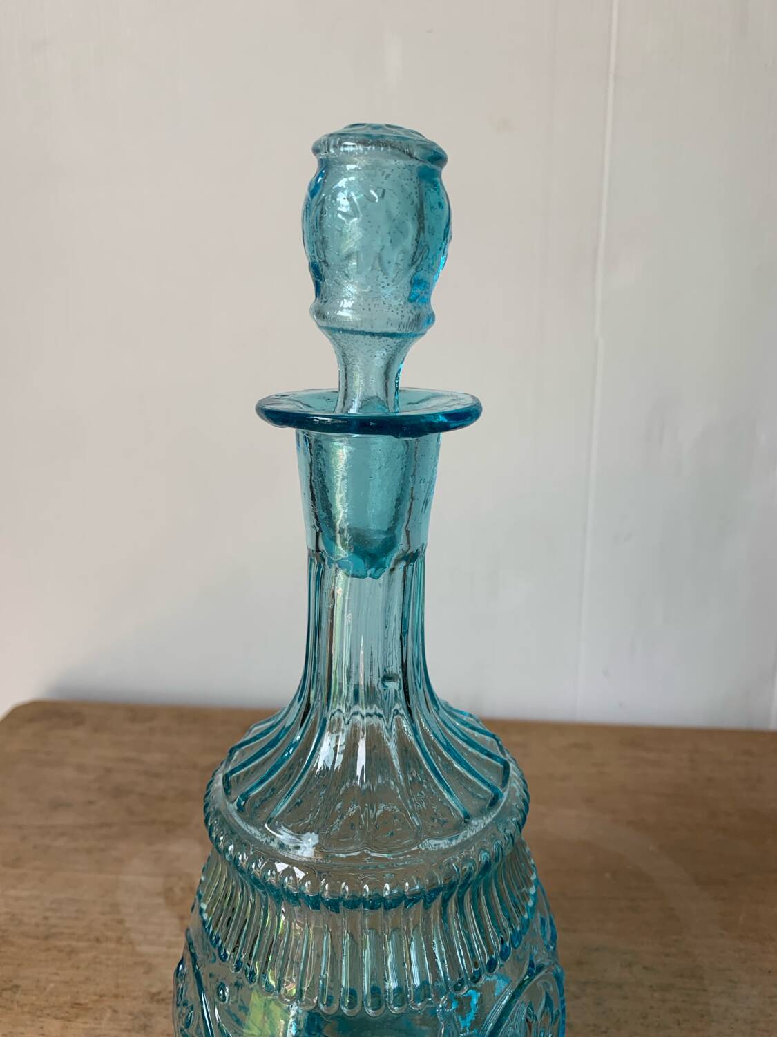 Old turquoise blue molded glass carafe