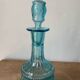 Old turquoise blue molded glass carafe