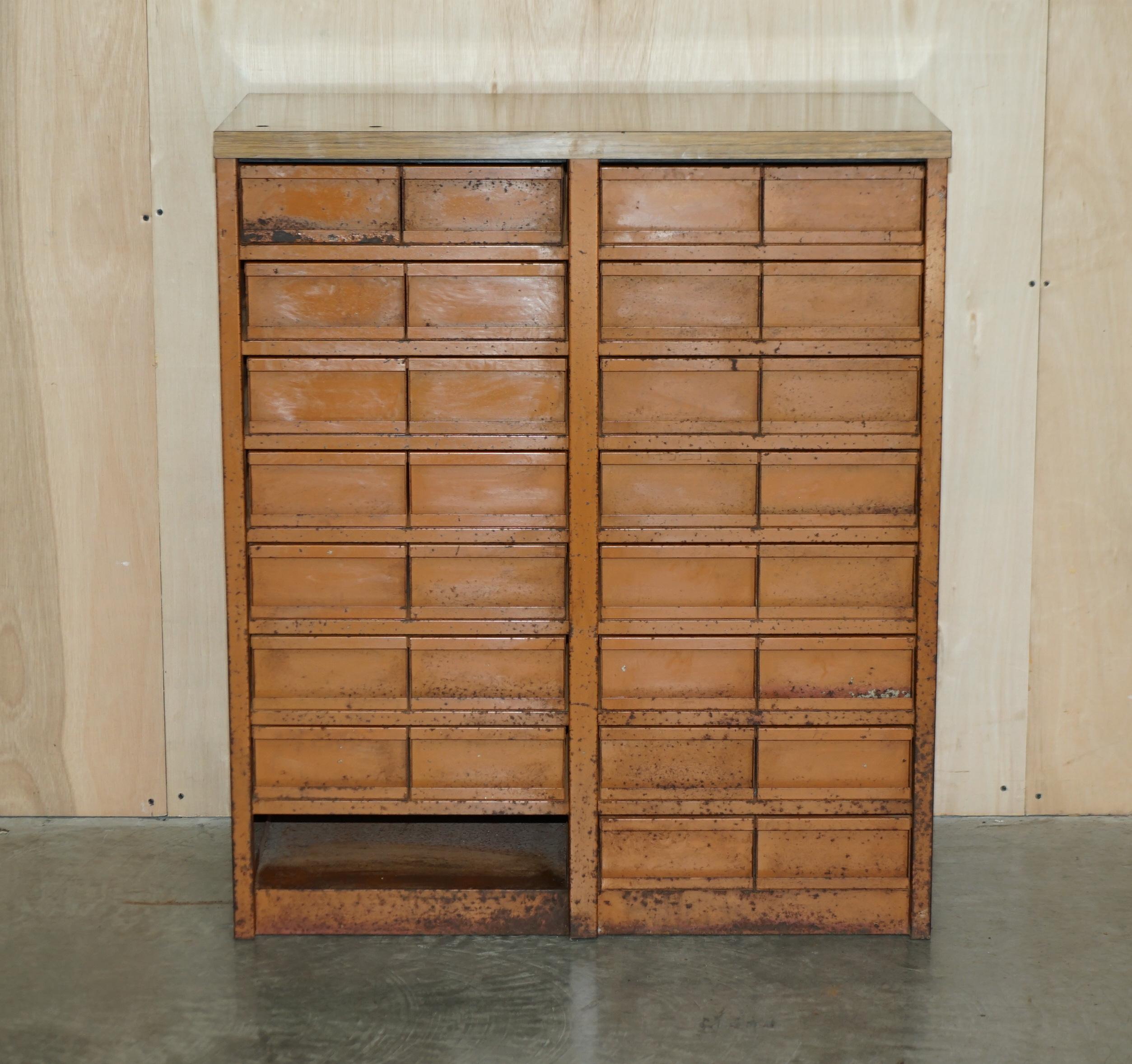 Industrial metal chest of drawers with 30 drawers.