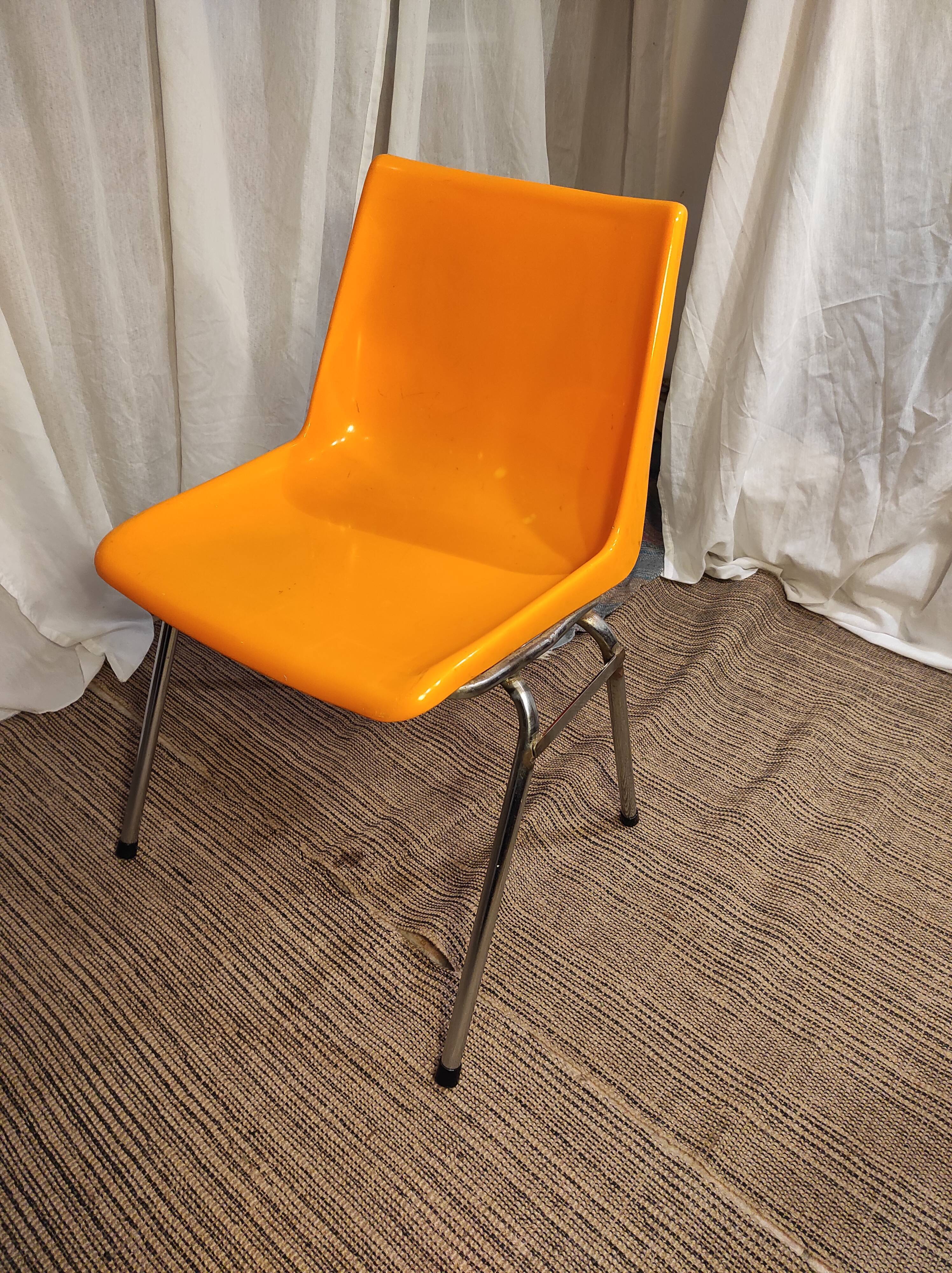 Orange plastic chair 1970