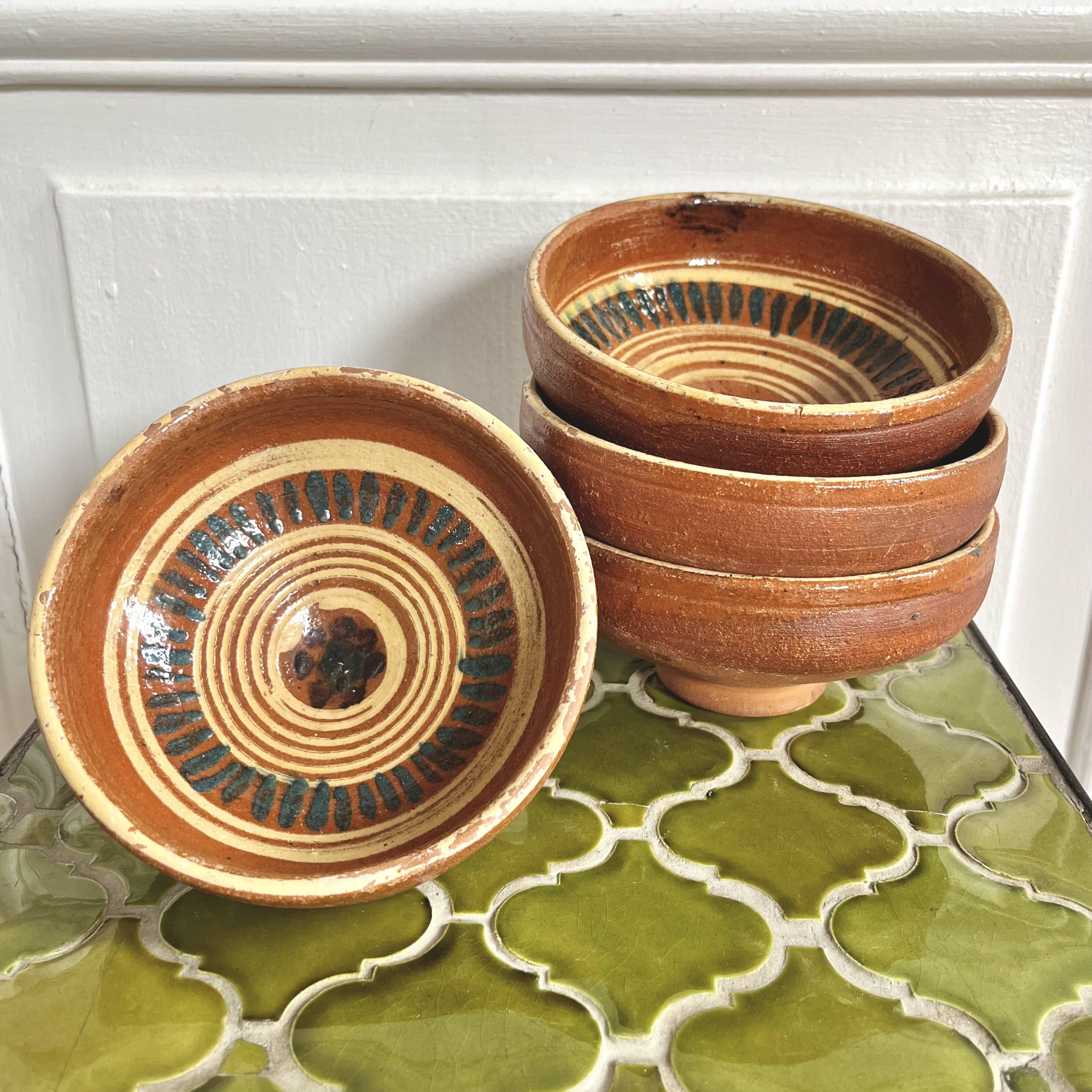 4 old handcrafted pottery bowls