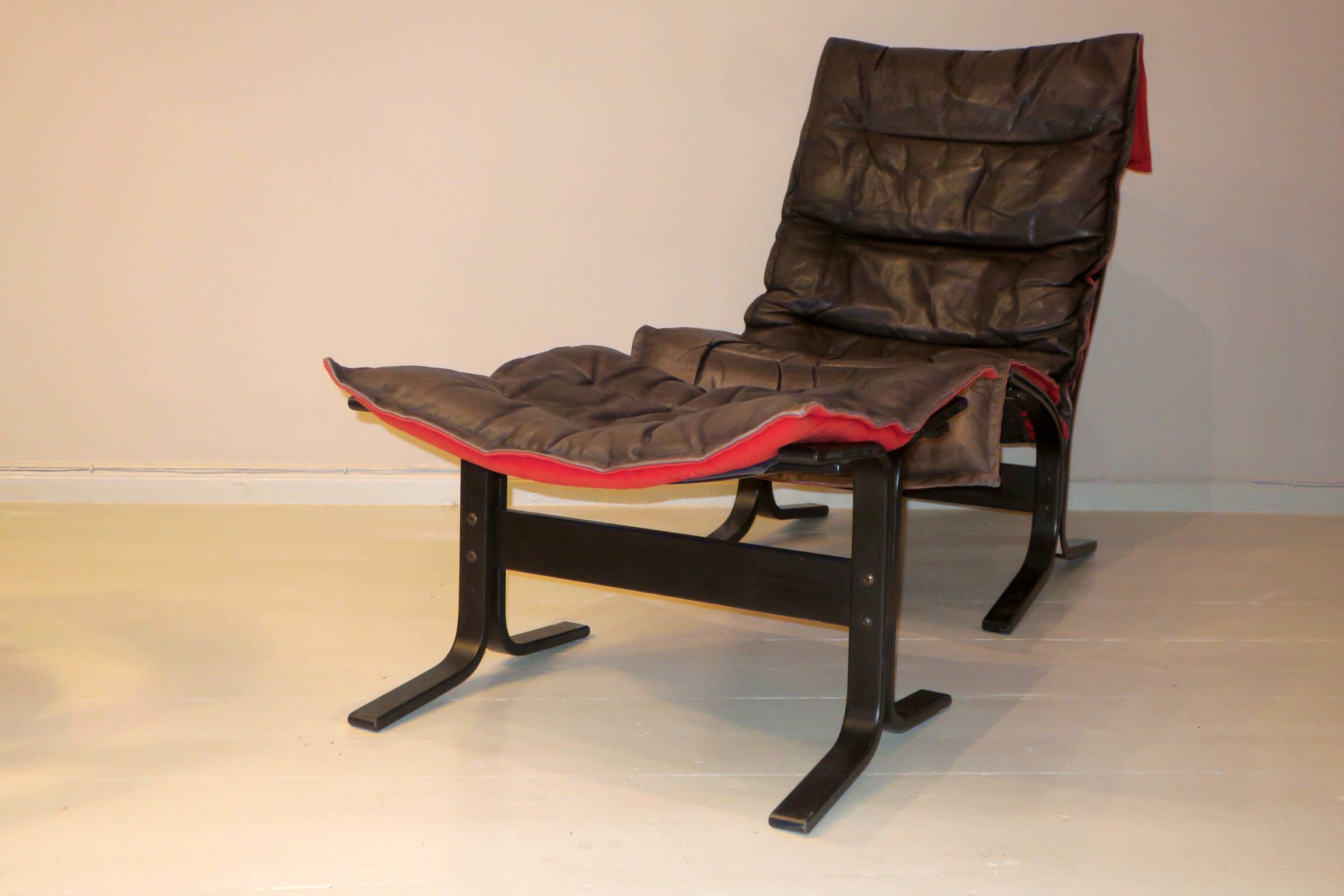 Westnofa patinated leather lounge chair with footrest, Norway 1960s