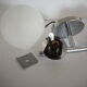 Pair of sconces with an opaline globe and chrome structure from the 1970s