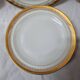 7 assiettes Limoges doré à l'or fin
