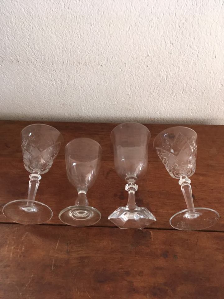 Four mismatched stemware